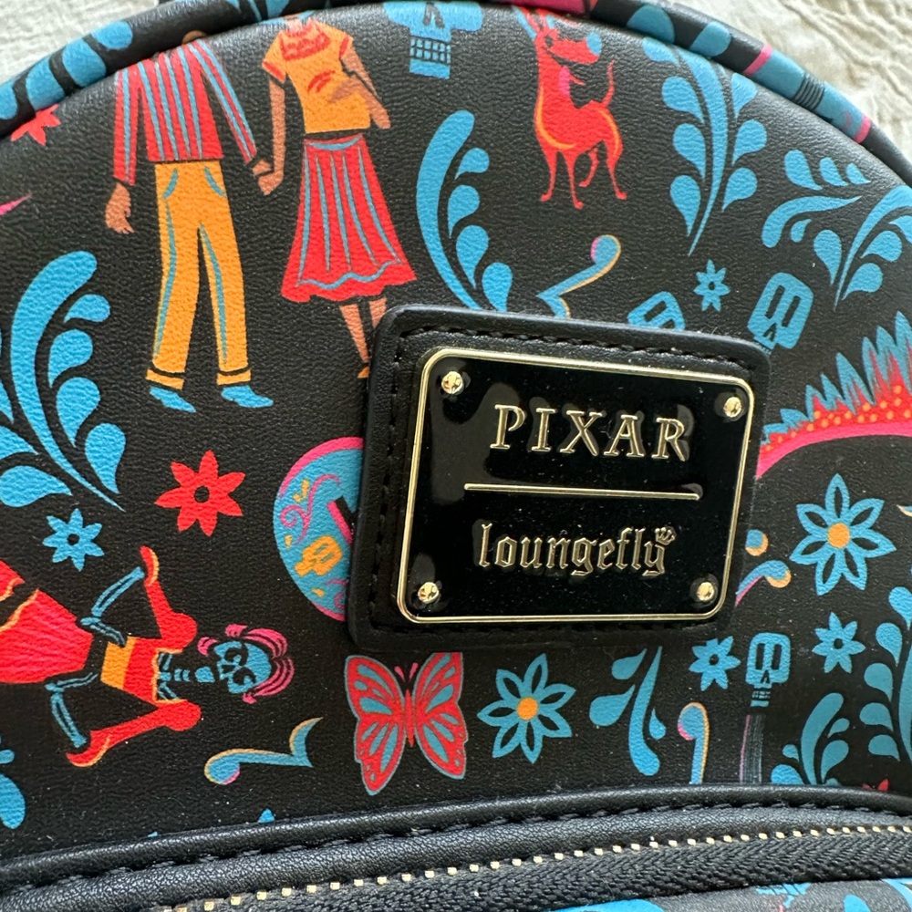 NWT Loungefly Coco backpack. Dia De Los Muertos.